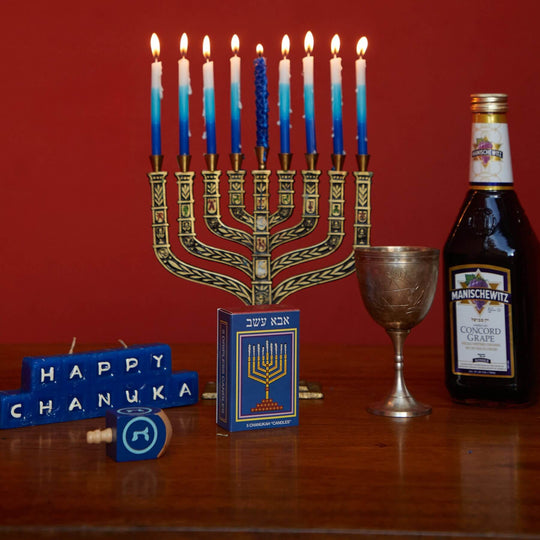 Chanukah Candles, wine, glass and cbd joints
