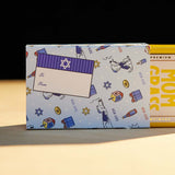 Mom Grass Stash Pack Coming Out From A Chanukah Gift Wrapping Paper