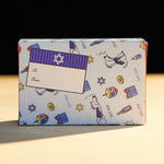 Dad Grass CBD Pre Roll Joints Pack On A Chanukah Gift Wrapping Paper