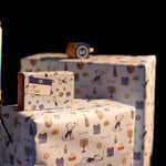 Chanukah Candles And Dad Stash Gift Packs On Wrapping Paper