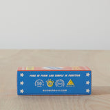 Dad Grass 5 pack hemp CBD pre rolls in Boomers firework sleeve bottom view with "PURE IN FORM AND SIMPLE IN FUNCTION" written on it