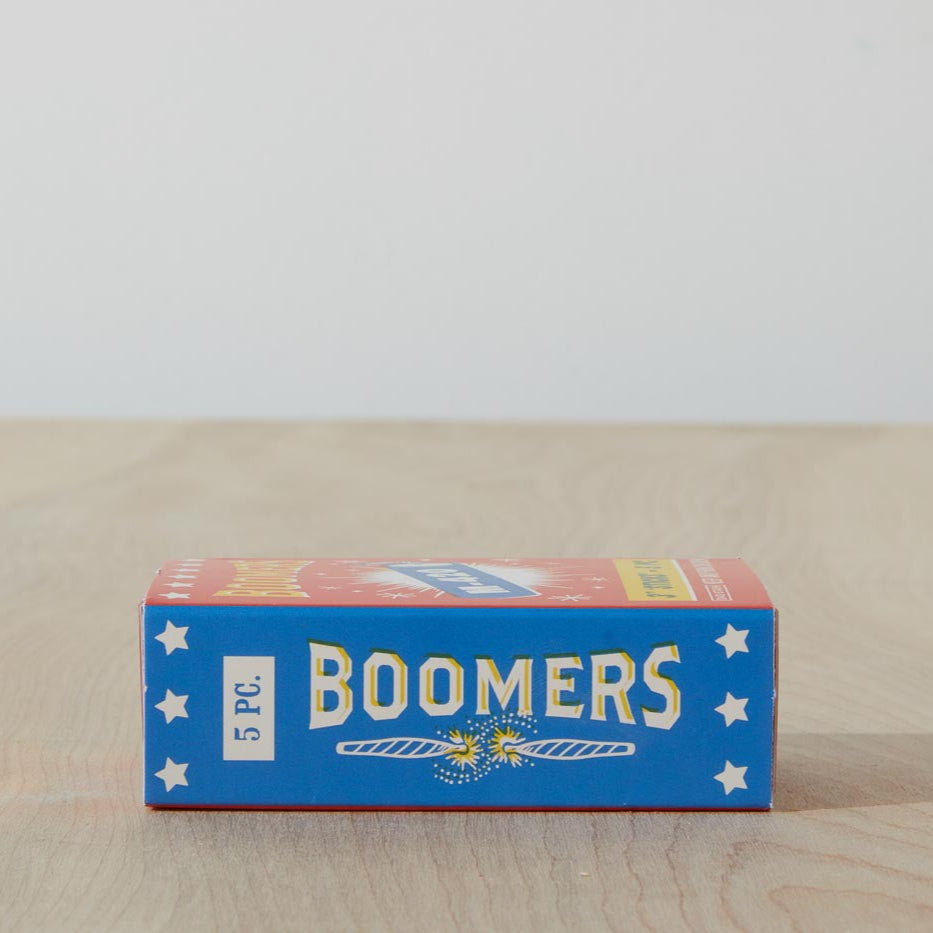 Dad Grass 5 pack hemp CBD pre rolls in Boomers firework pack side view with "BOOMERS" written on it