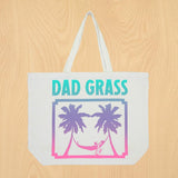 Dad Grass x Free & Easy Summer 2021 white unisex pool tote bag on wooden table