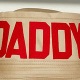 Dad Grass Pride 2021 tan bucket hat, close up view of front word "Daddy"