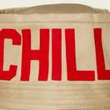 Dad Grass Pride 2021 tan bucket hat, close up view of rear word "Chill"