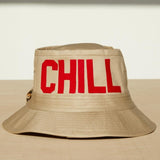 Dad Grass Pride 2021 'DADDY CHILL' tan bucket hat. Rear view says 'CHILL'.