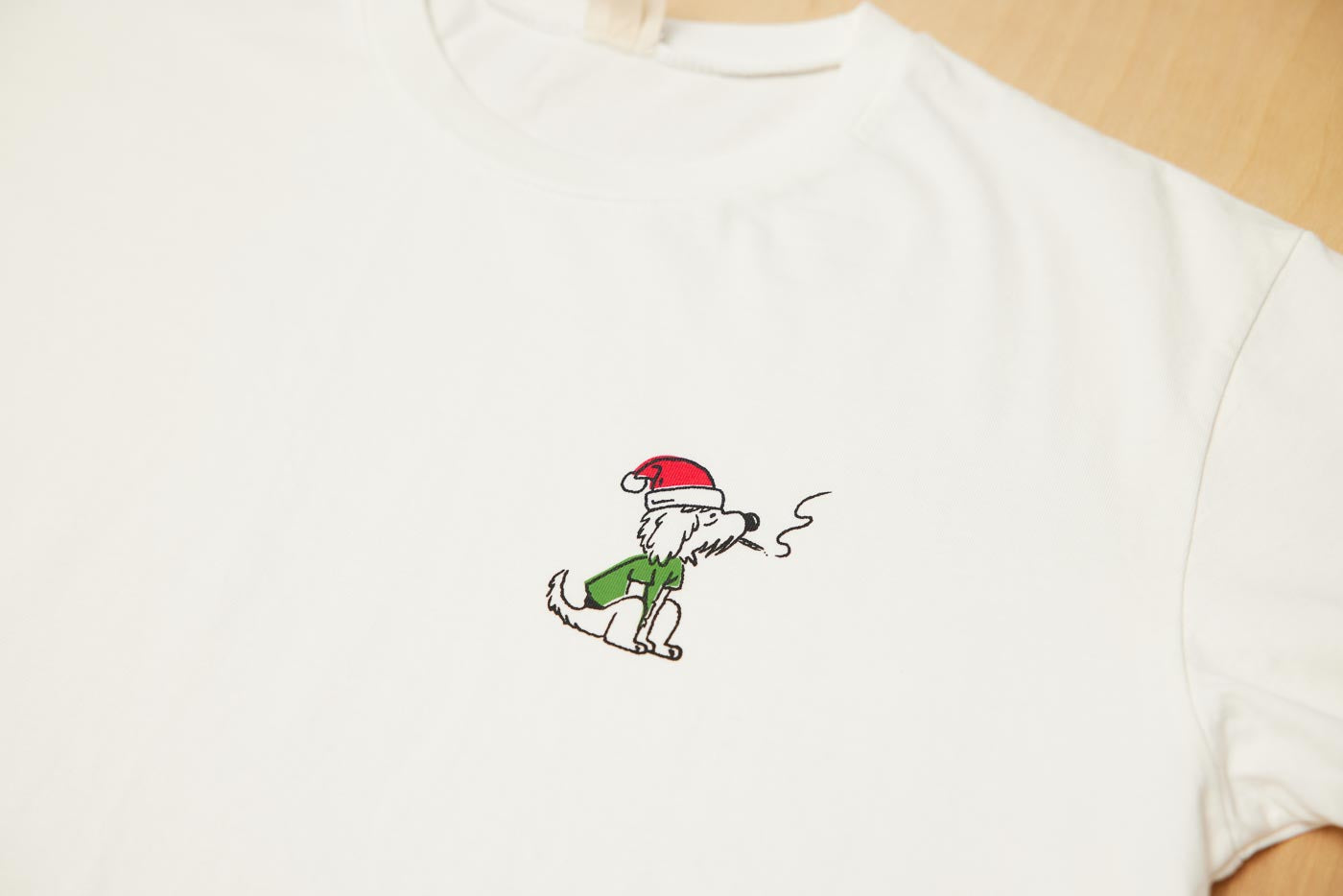 Santa Rollie Smoking CBD Pre Roll Joint Logo On A Dad Grass White Tee
