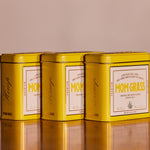 Three Mom Grass CBG Hemp Flower In A Yellow Tin