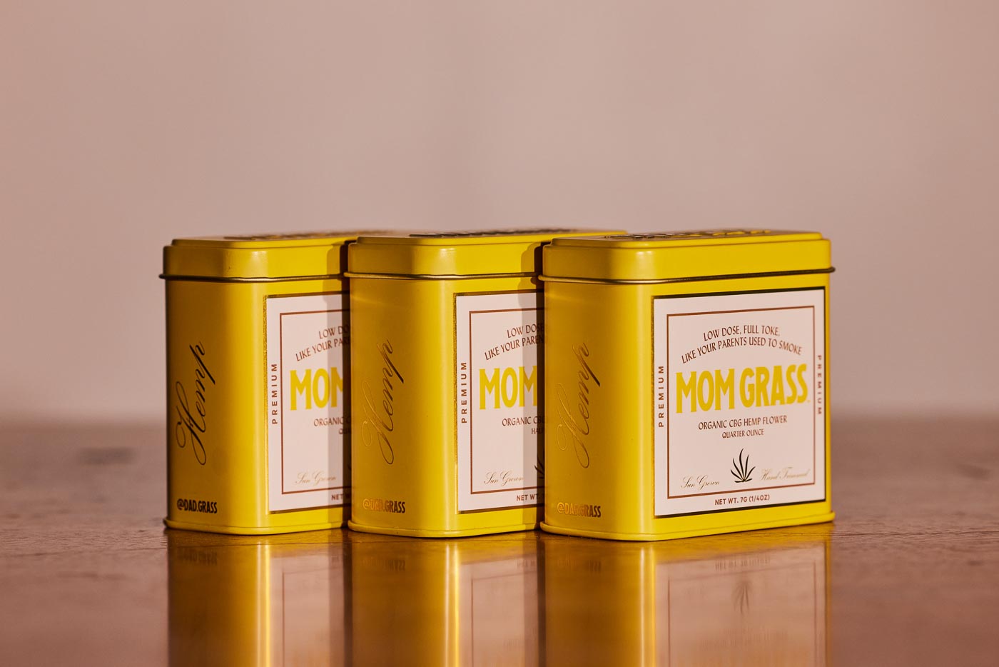 Three Mom Grass CBG Hemp Flower In A Yellow Tin