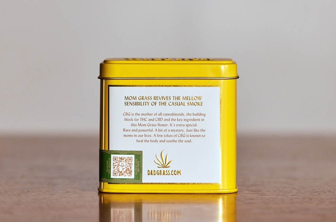 Mom Grass CBG Hemp Flower In A Yellow Tin Back View