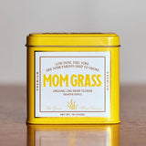 Mom Grass CBG Hemp Flower Quater Ounce In A Yellow Tin
