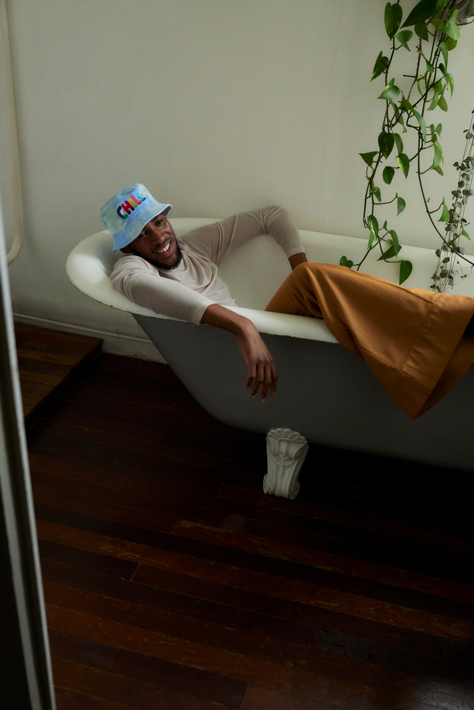 A Man wearing Dad Grass's Pride Hat
