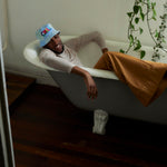 A Man wearing Dad Grass's Pride Hat