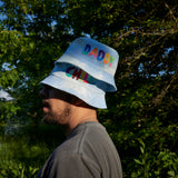 Man Wearing "Daddy Chill" Pride 2022 Bucket Hat - Dad Grass