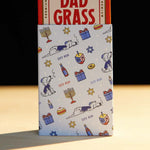 Dad Stash Pack Coming Out From A Chanukah Gift Wrapping Paper 