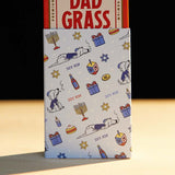 Dad Stash Pack Coming Out From A Chanukah Gift Wrapping Paper 