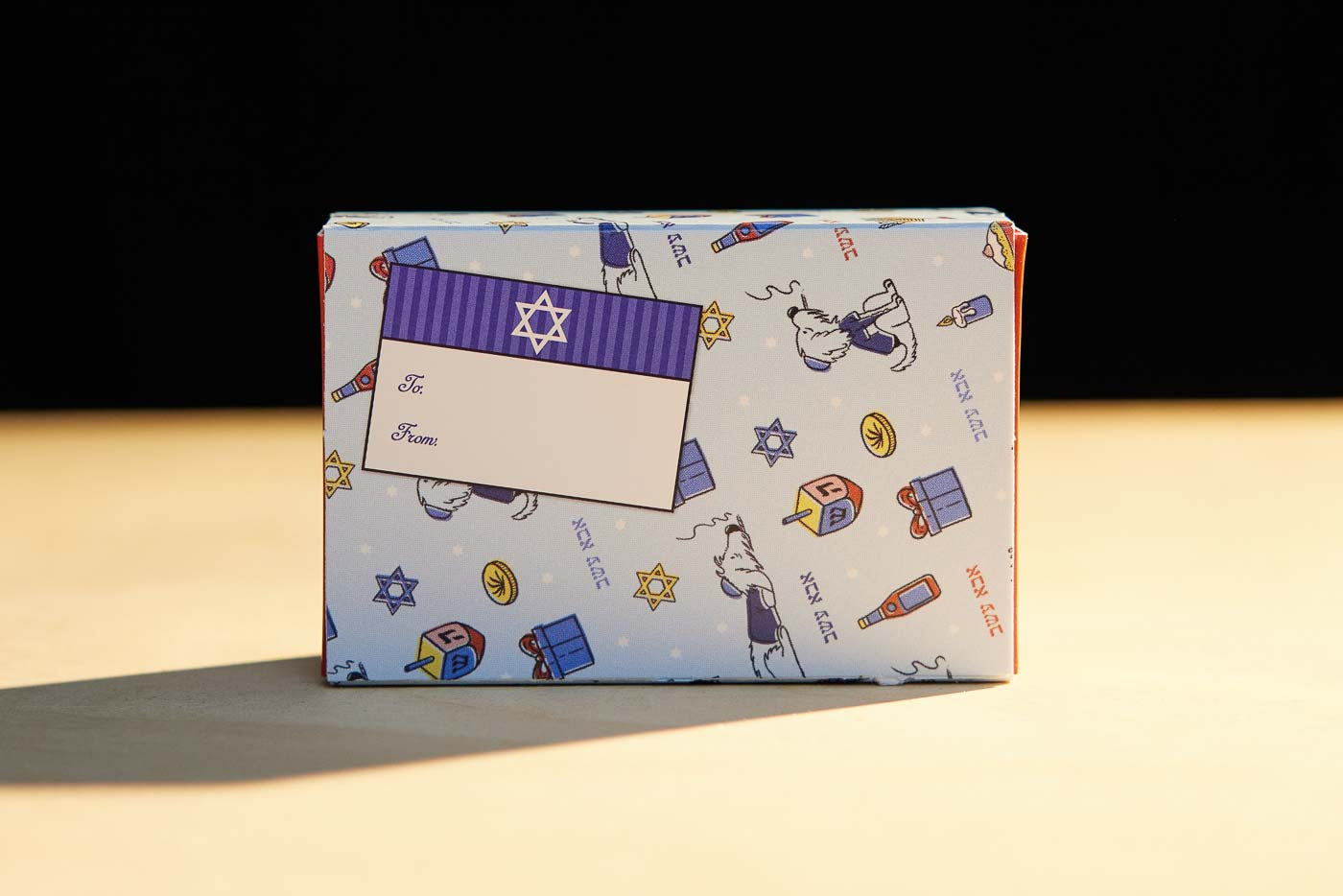 Dad Grass CBD Pre Roll Joints Pack On A Chanukah Gift Wrapping Paper