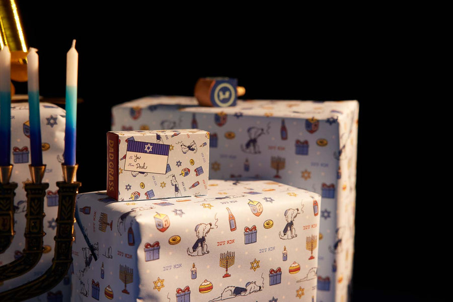 Chanukah Candles And Dad Stash Gift Packs On Wrapping Paper