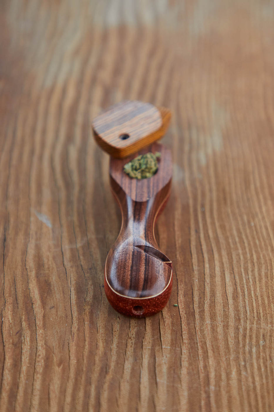 Dad Grass wood vintage smoking pipe with swivel lid and hemp CBD flower bottom view