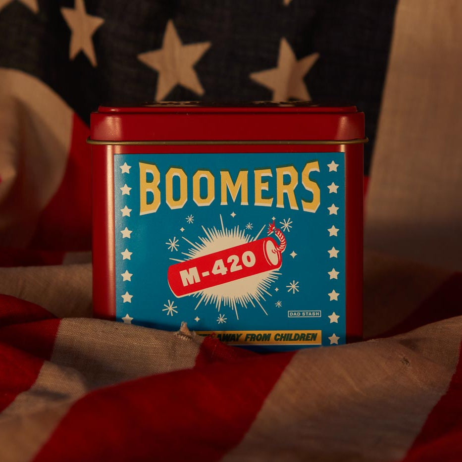 Dad Grass CBD hemp flower in Boomers firework tin can on American flag