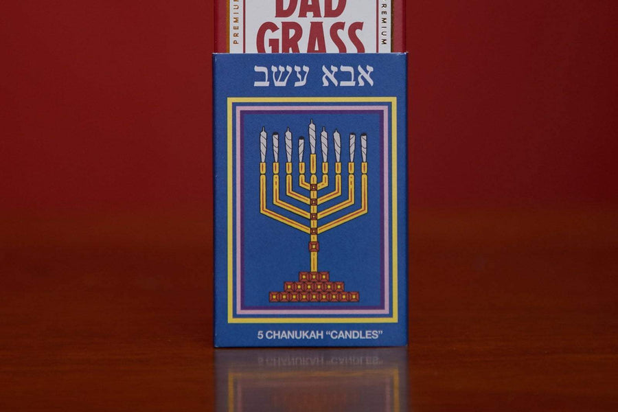 Dad Grass CBD Pre Roll Joints Pack Coming Out From A Chanukah Candles Pack