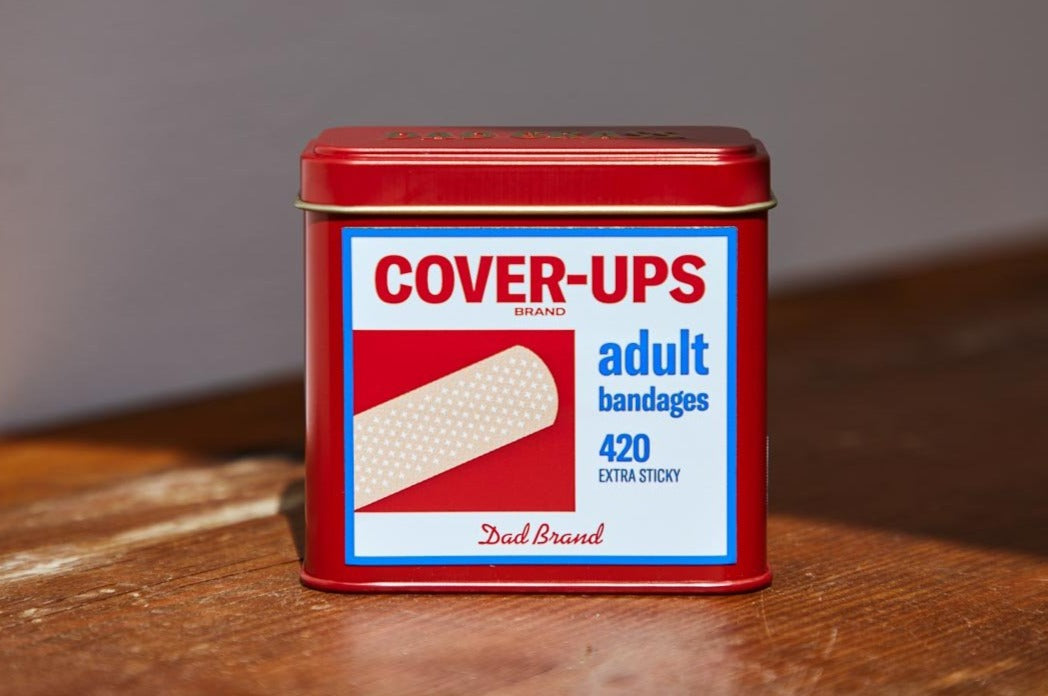 Dad Grass CBD Hemp Flower In A Red Tin With Cover Up Pack Close Up