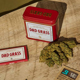 Dad Grass CBD Hemp Flower With Nugs and Rolling Paper On The Table