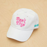 Dad Grass x Free & Easy Summer 2021 White Unisex Don't trip hat on wooden table