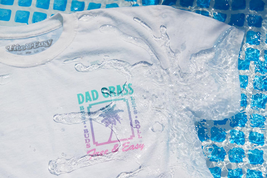 Dad Grass x Free & Easy Summer 2021 White Unisex Tee Shirt front view in the pool