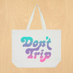 Dad Grass x Free & Easy Summer 2021 white unisex don't trip pool tote bag on wooden table