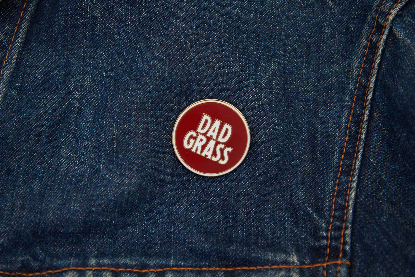 Dad Grass Circle Pin on denim