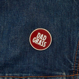 Dad Grass Circle Pin on denim