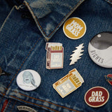 Dad Grass Pack Pin with other Pins on denim jacket