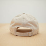 Dad Grass Cream White Dad Hat With Rollie Dog Back View
