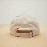 Dad Grass Cream White Dad Hat With Rollie Dog Back View