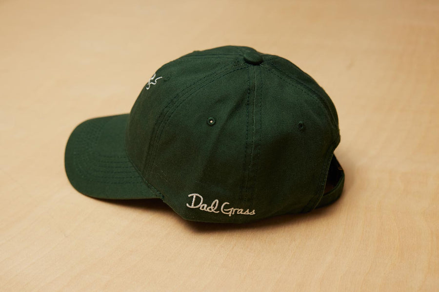 Dad Grass Written On A Dark Green Dad Hat