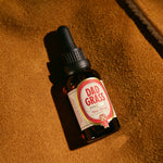 Dad Grass CBD Tincture Classic Formula 30 ML Bottle With 1200 MG Of CBD On A Brown Carpet