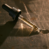 Dad Grass CBD Tincture Classic Formula Coming Out From A Dropper