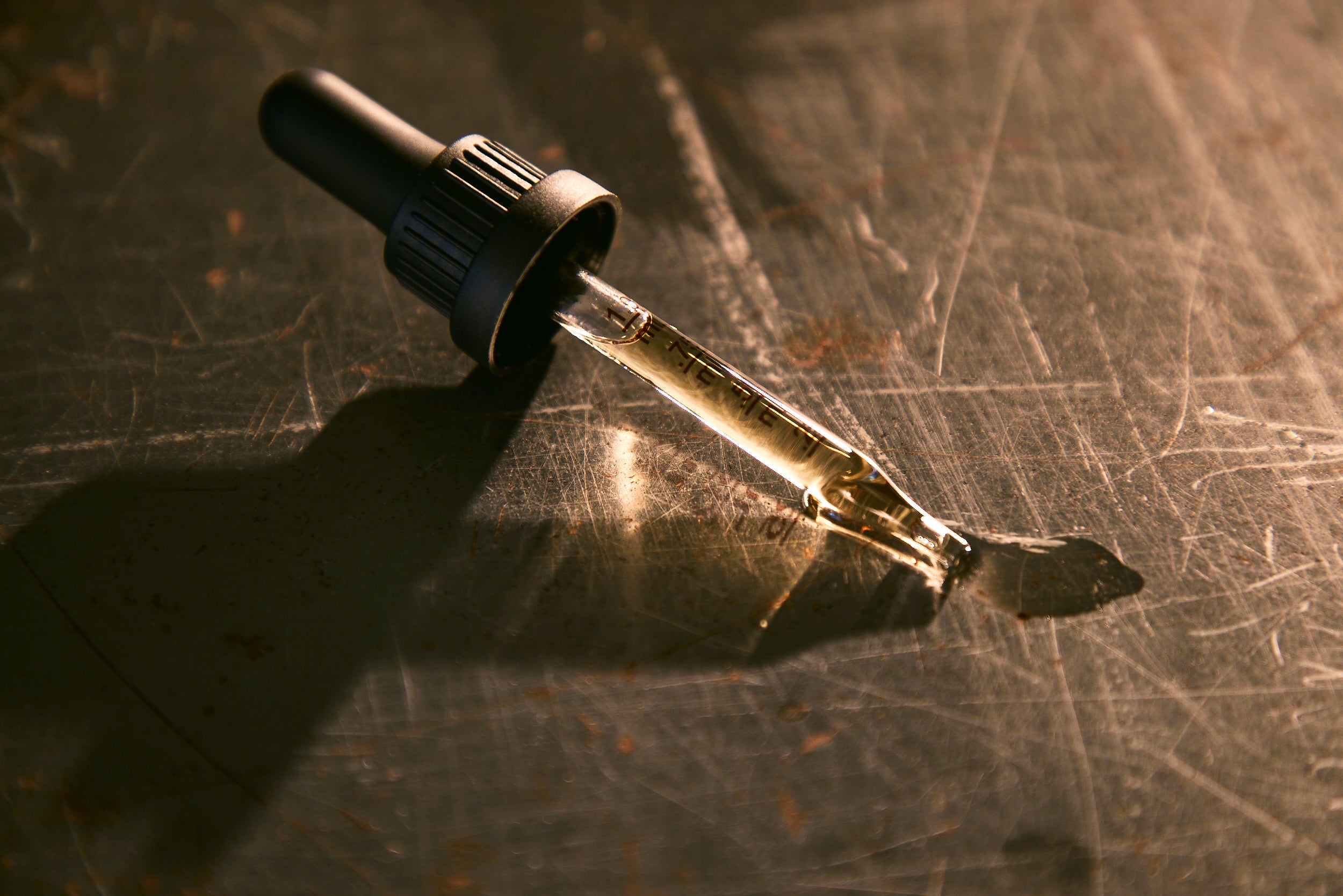 Dad Grass CBD Tincture Classic Formula Coming Out From A Dropper