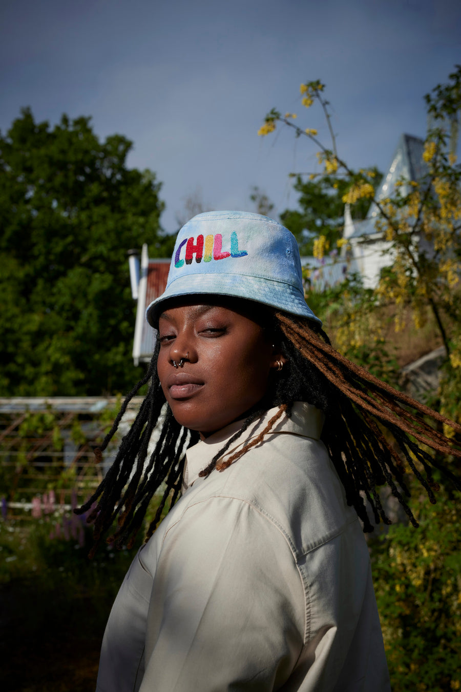 A Woman wearing "Daddy Chill" Bucket Hat